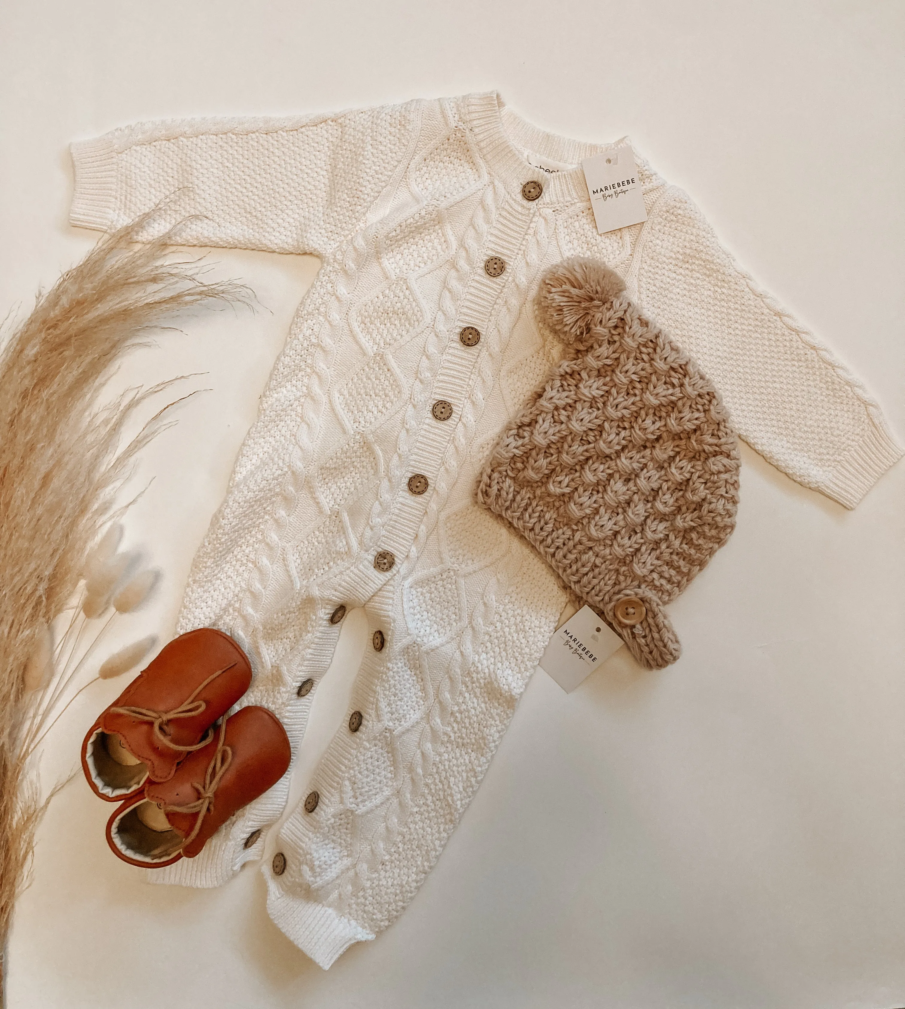 Knitted baby jumpsuit